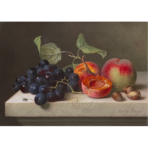 Still life with grapes, peaches and hazelnuts on a marble platter